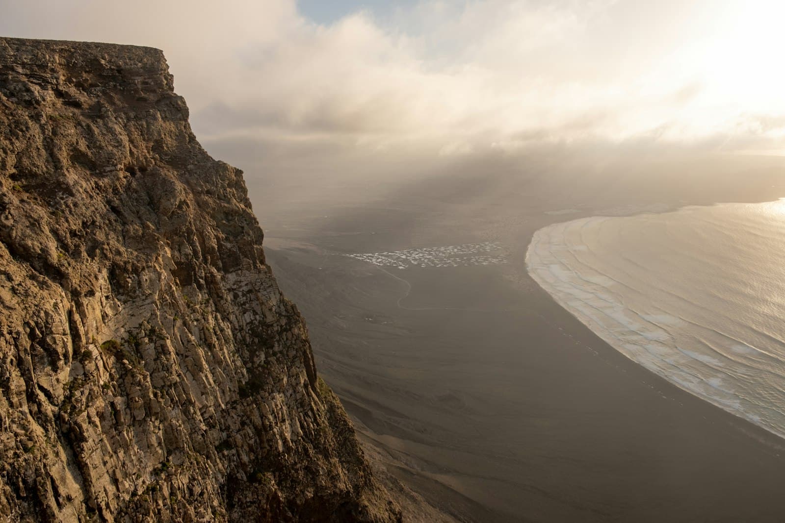 A view out over the ocean from high on a mountainside.